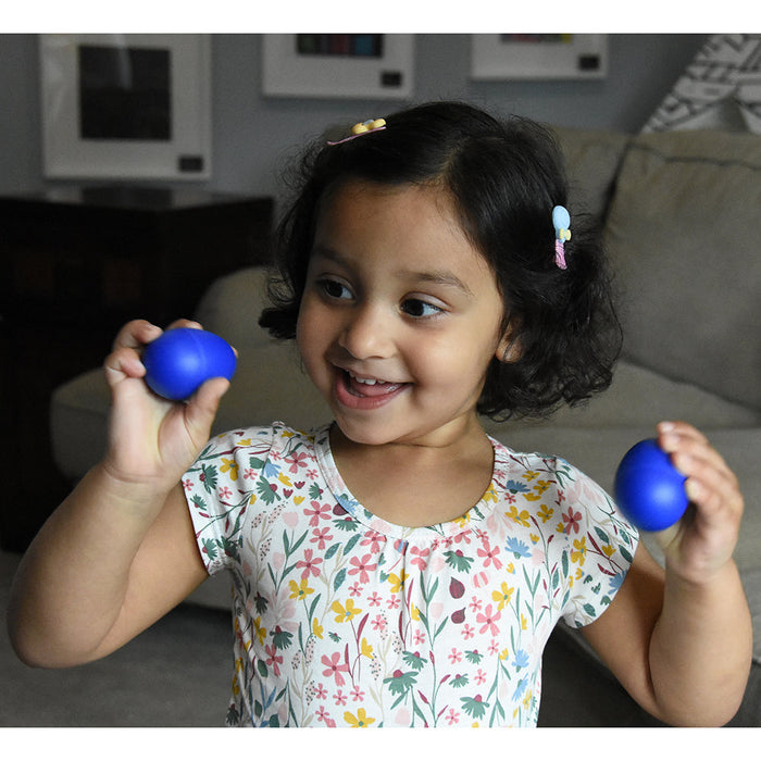 Kid Using Egg Shaker Set