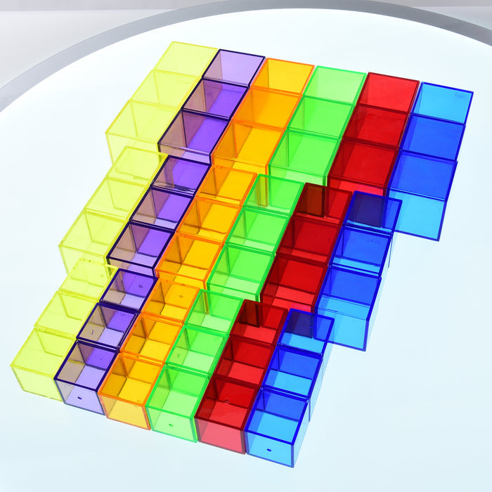 Colorful transparent cube puzzle on a white background