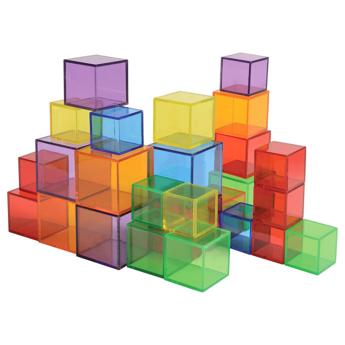 Colorful transparent cube building blocks on a white background
