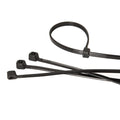 Black cable ties on a white background