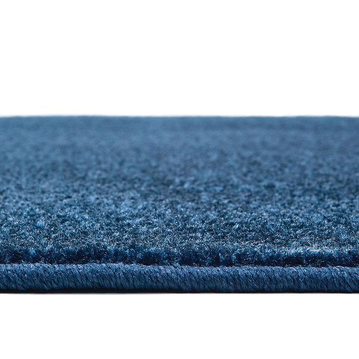 Double-stitched Serged Edges on Blueberry Colored Rug