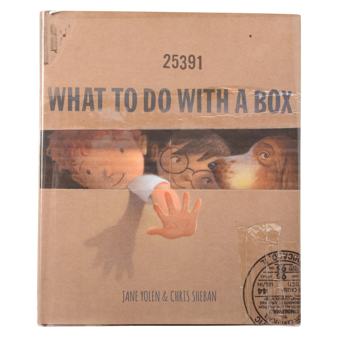 Book cover of 'What to Do with a Box' by Jane Yolen and Chris Sheban, featuring cardboard texture and illustrations.