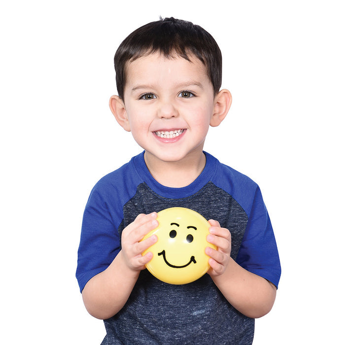 Child Being Happy with Smiling Yellow  Ball