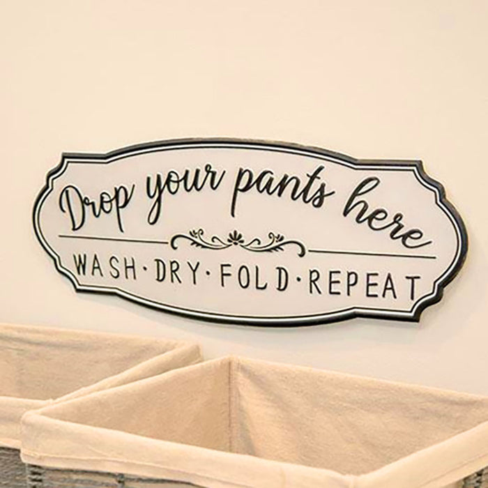 drop your pants here laundry sign