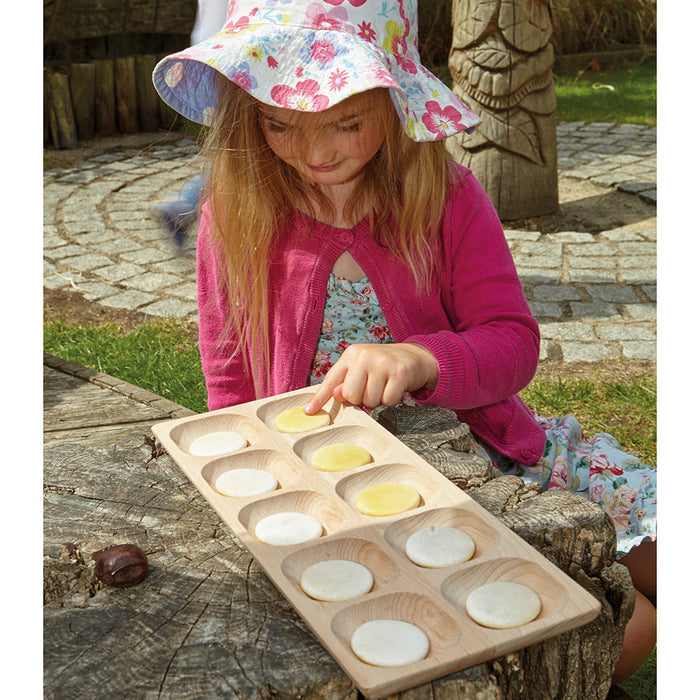 Kid Using Wooden 10-Frame Math Tray for Outdoor Exploration