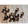 Close-up of matte gold metal construction and glossy black eye lenses
