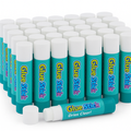 Multiple glue sticks with blue and white packaging on a white background