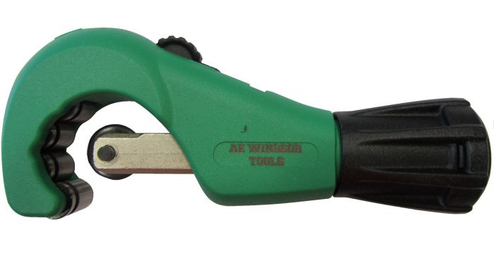 Green pipe cutter with black handle on a white background
