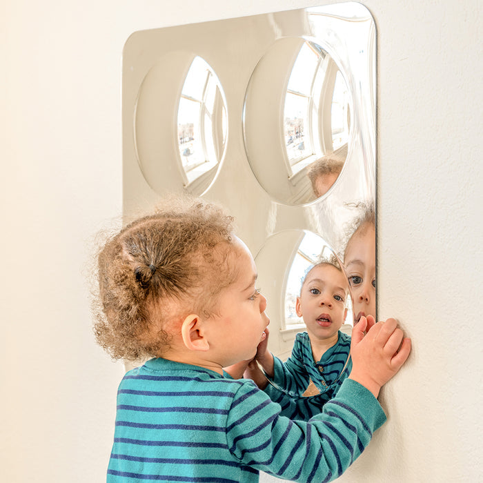 Toddler Engaging with Her Own Reflection in Acrylic Wall Bubble Dome Mirror