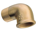 Brass elbow pipe fitting on a white background