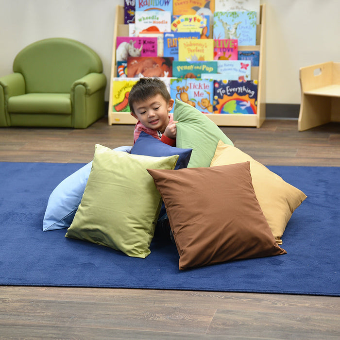 Child in a Classroom Surrounded by Natural & Calm Colors Oversized Pillows