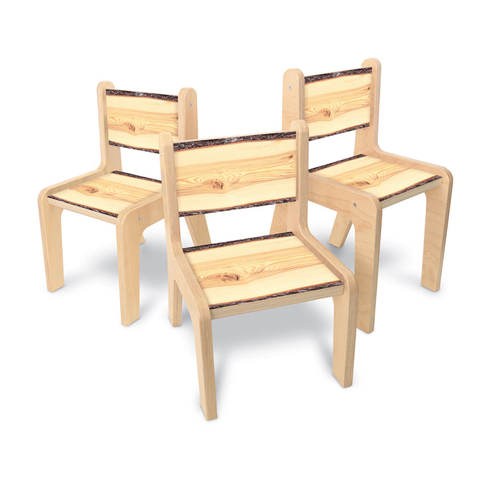 Three wooden chairs with a white background