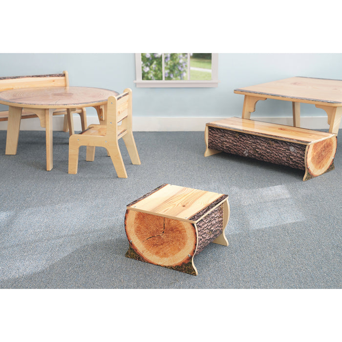 Wooden furniture set including a table, chairs, and benches on a gray floor.
