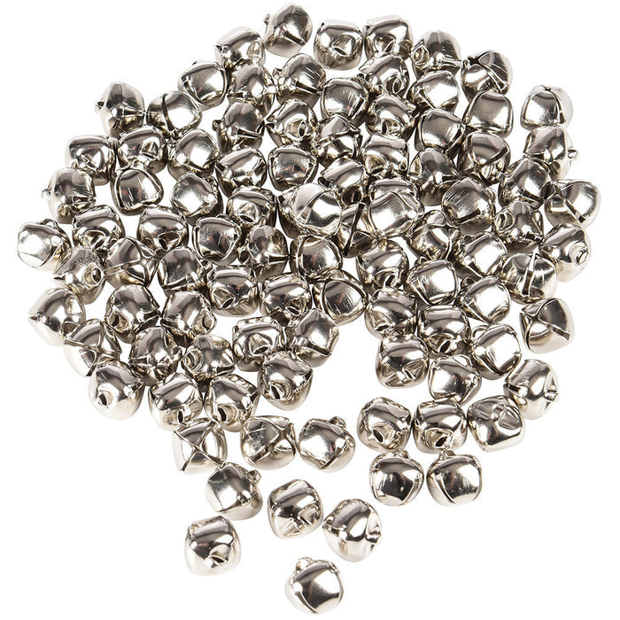 Pile of nickel plated jingle bells on white background