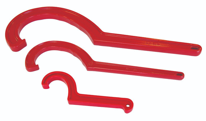 Three red metal hooks of varying sizes on a white background