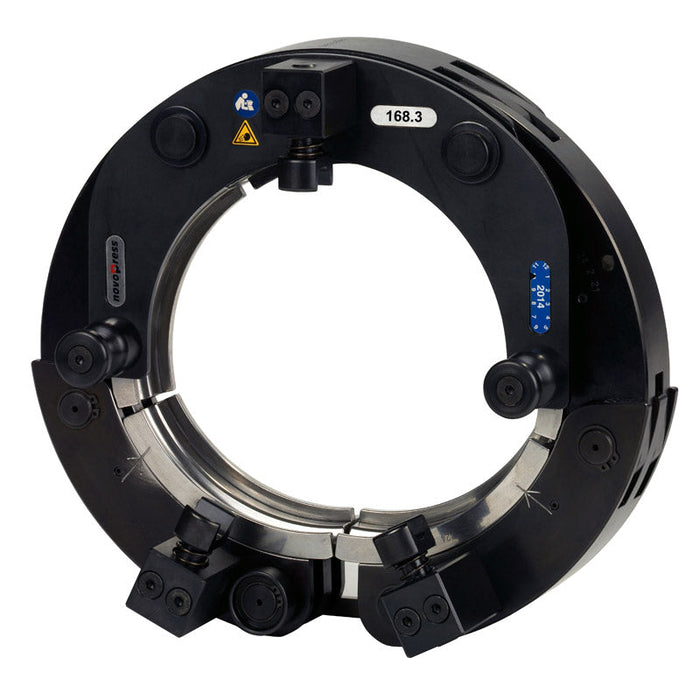 Black metal ring component with various features on a white background