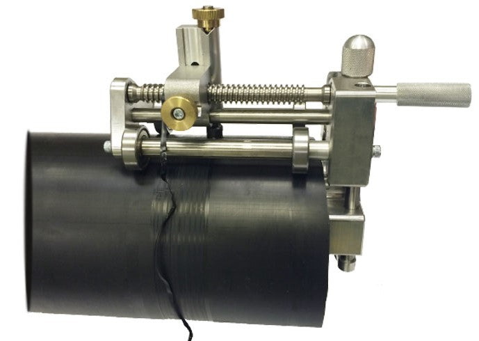 Mechanical device with a cylindrical component on a white background