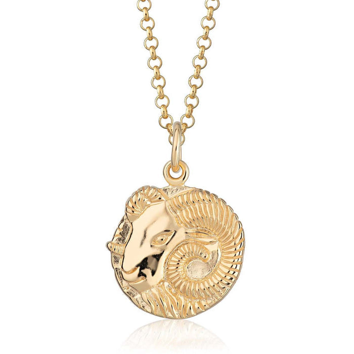 Scream Pretty brand gold Aries zodiac star sign necklace on a white background