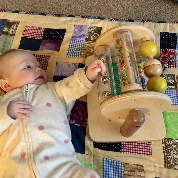 Baby Exploring Sight & Sound Sensory Drum