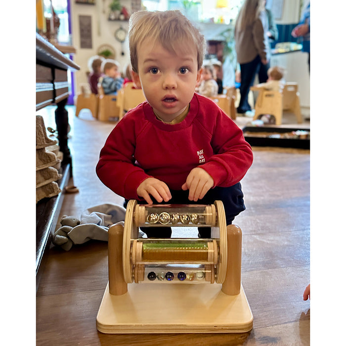 Child Engaging with Sight & Sound Sensory Drum