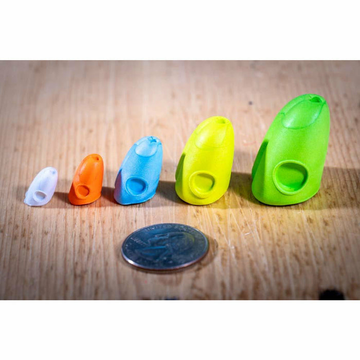 Side view of five colored double barrel popper slider bodies showing circular eye holes and size profile