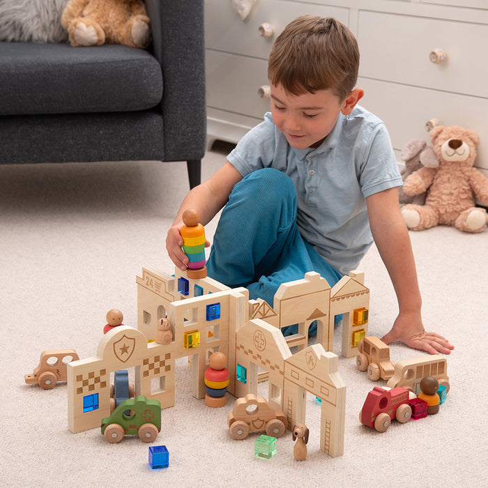 Kid Engaging in Pretend Play with Tactile Town Discovery Dividers