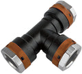 Black and brown plumbing fitting on a white background