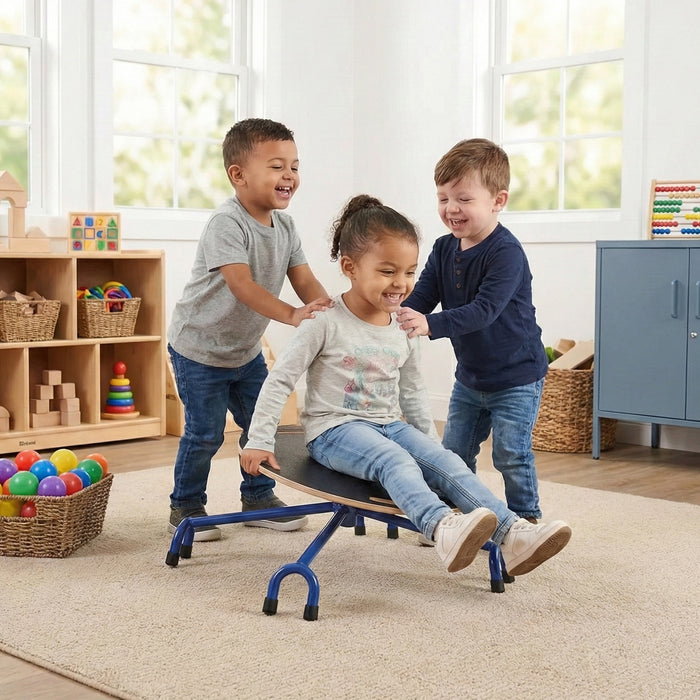 Three children playing with a balance chair in a classroom setting.