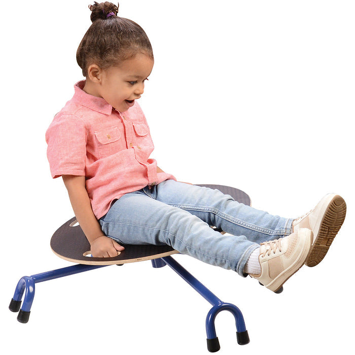 child sitting on balance chair