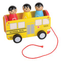 Wooden toy school bus with pull string and three figurines on a white background