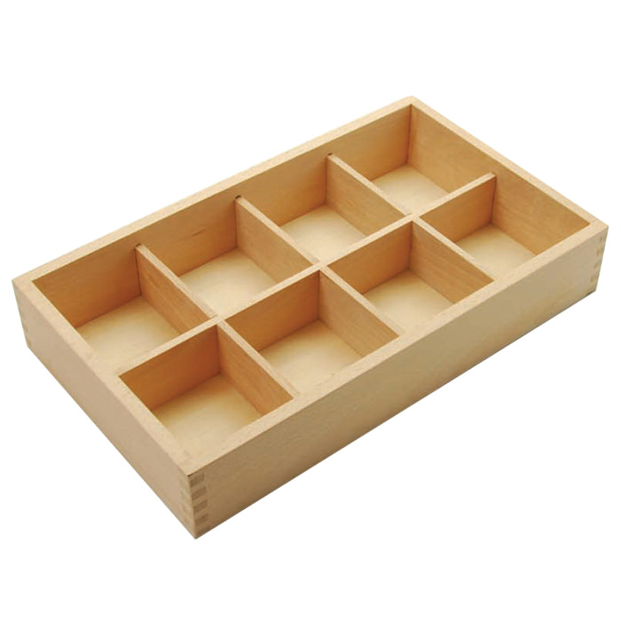 Wooden compartmentalized tray on a white background